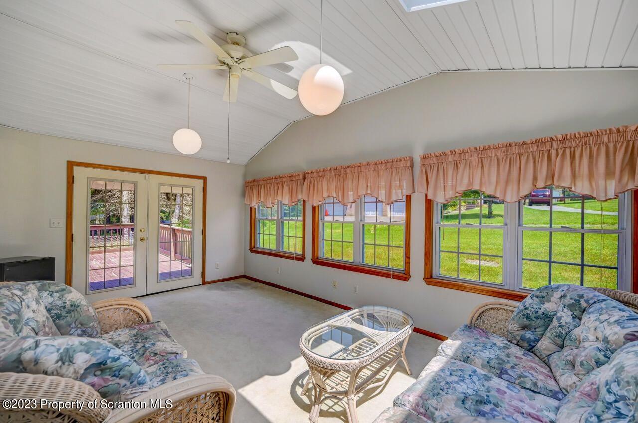 3 T-338 Moscow, PA 18444 - Photo 43 of 62 a living room with furniture and a large window