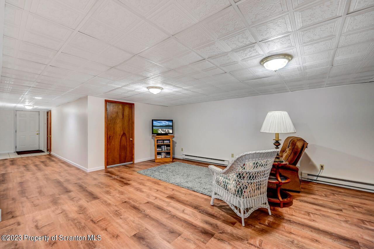 3 T-338 Moscow, PA 18444 - Photo 46 of 62 a view of a room with furniture and wooden floor