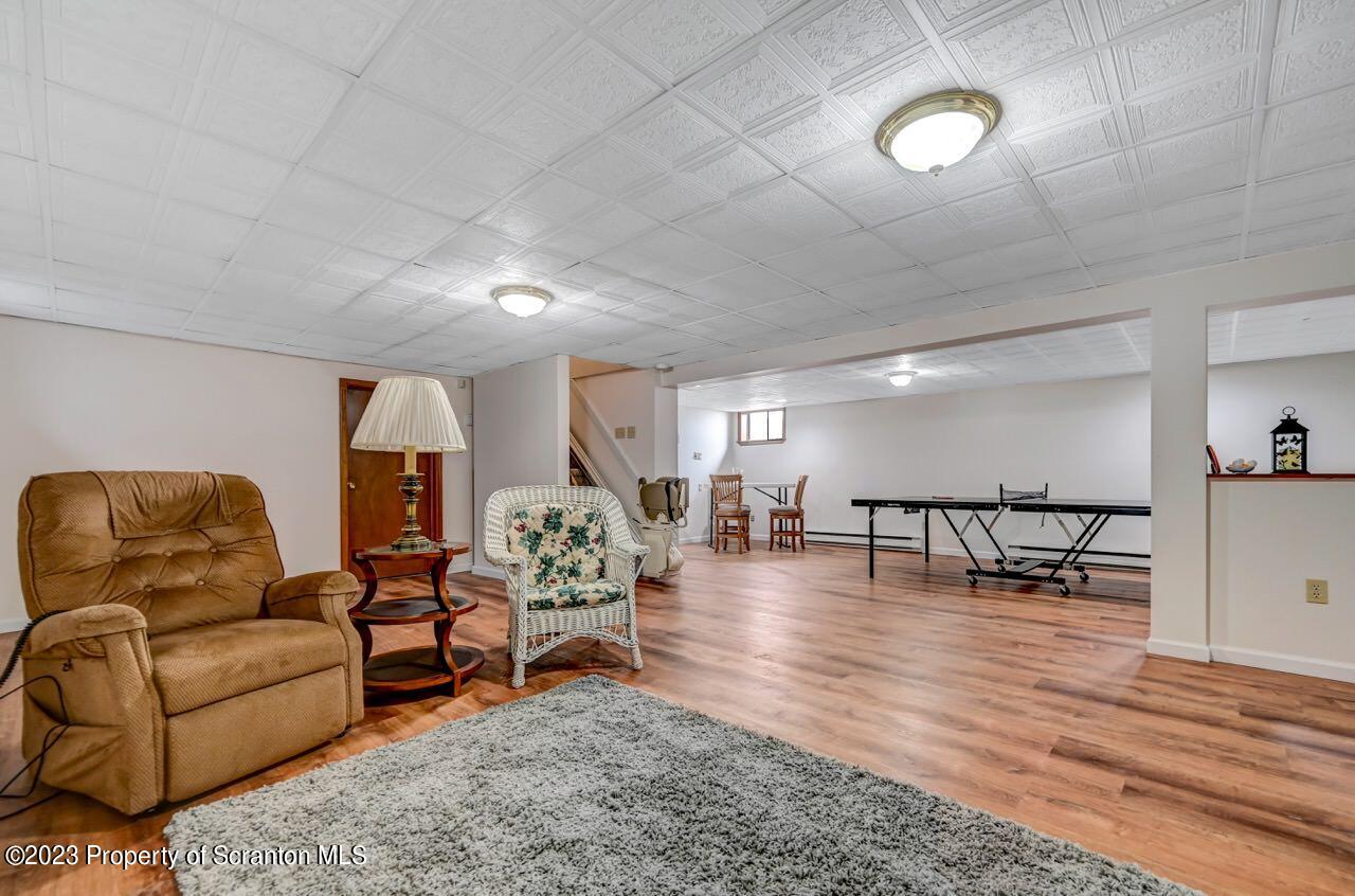 3 T-338 Moscow, PA 18444 - Photo 48 of 62 a living room with furniture and wooden floor