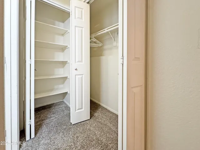 a view of a room with rack on the wall