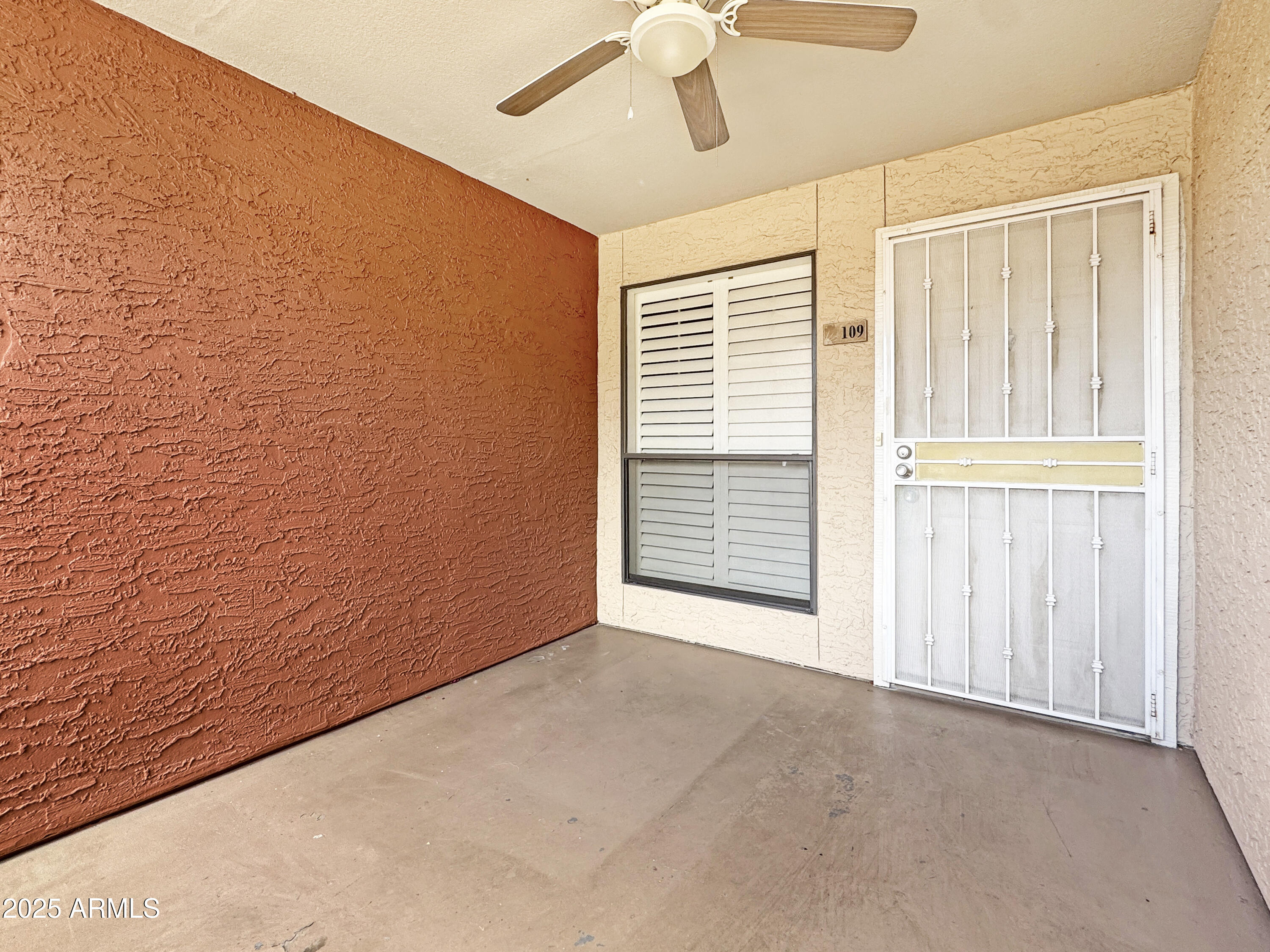 1340 North Recker Road, Unit 109 Mesa, AZ 85205 - Photo 9 of 12 screen door & covered patio