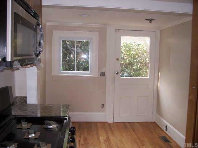 726 Gaston Street Raleigh, NC 27605 - Photo 5 of 9 Sunny dining area with access to side yard deck.