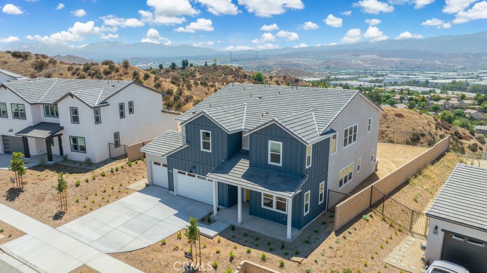 29818 Old Ranch Circle Castaic, CA 91384 - Photo 2 of 41 an aerial view of residential houses with wooden floor