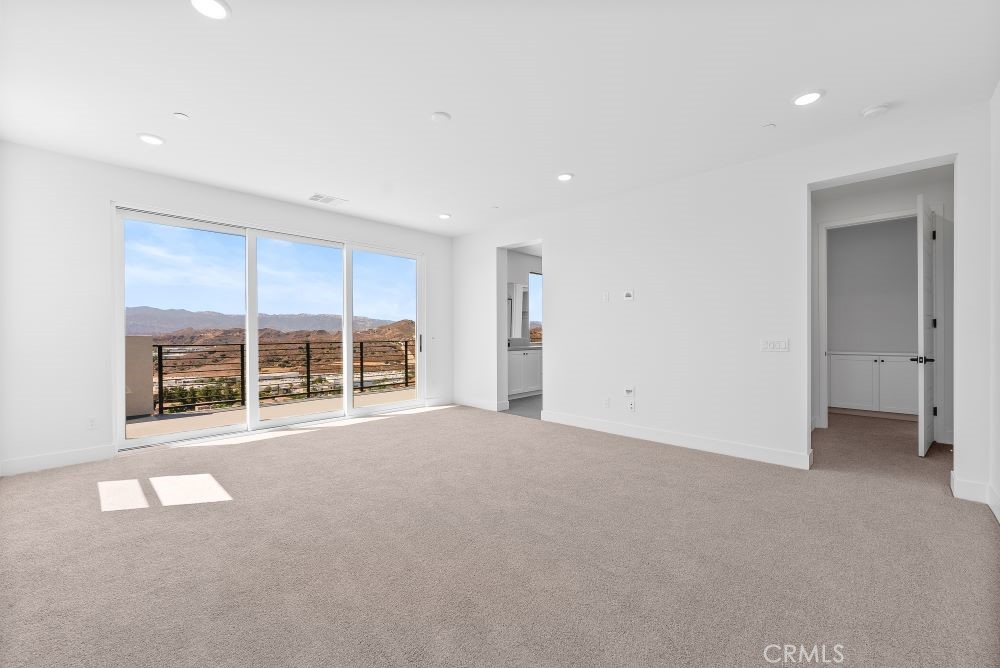29818 Old Ranch Circle Castaic, CA 91384 - Photo 23 of 41 a view of an empty room with a window