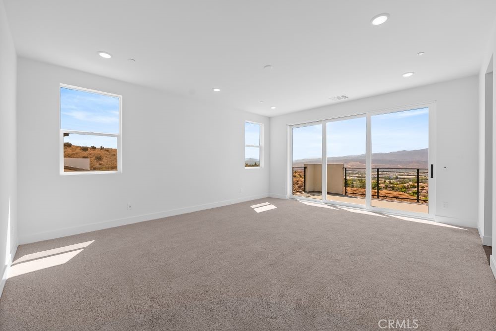 29818 Old Ranch Circle Castaic, CA 91384 - Photo 24 of 41 a view of an empty room with a window