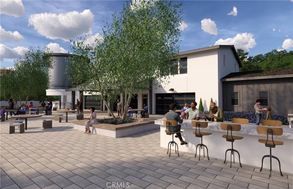 29818 Old Ranch Circle Castaic, CA 91384 - Photo 38 of 41 a view of the patio with dining table and chairs and potted plants