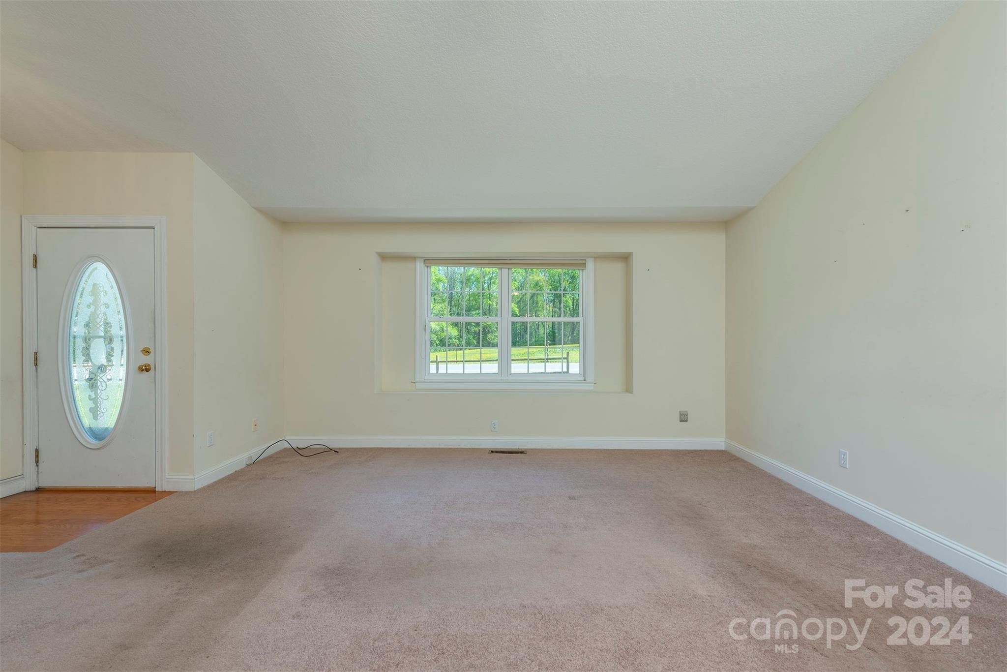 379 Buckeye Cove Road Swannanoa, NC 28778 - Photo 14 of 31 an empty room with windows