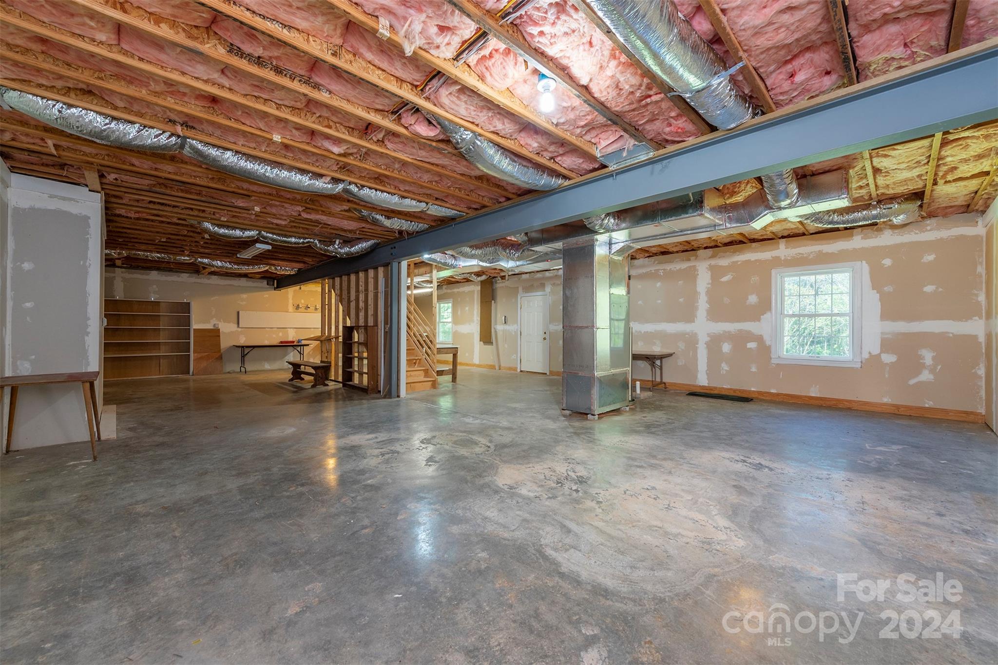 379 Buckeye Cove Road Swannanoa, NC 28778 - Photo 19 of 31 a view of empty room with wooden floor