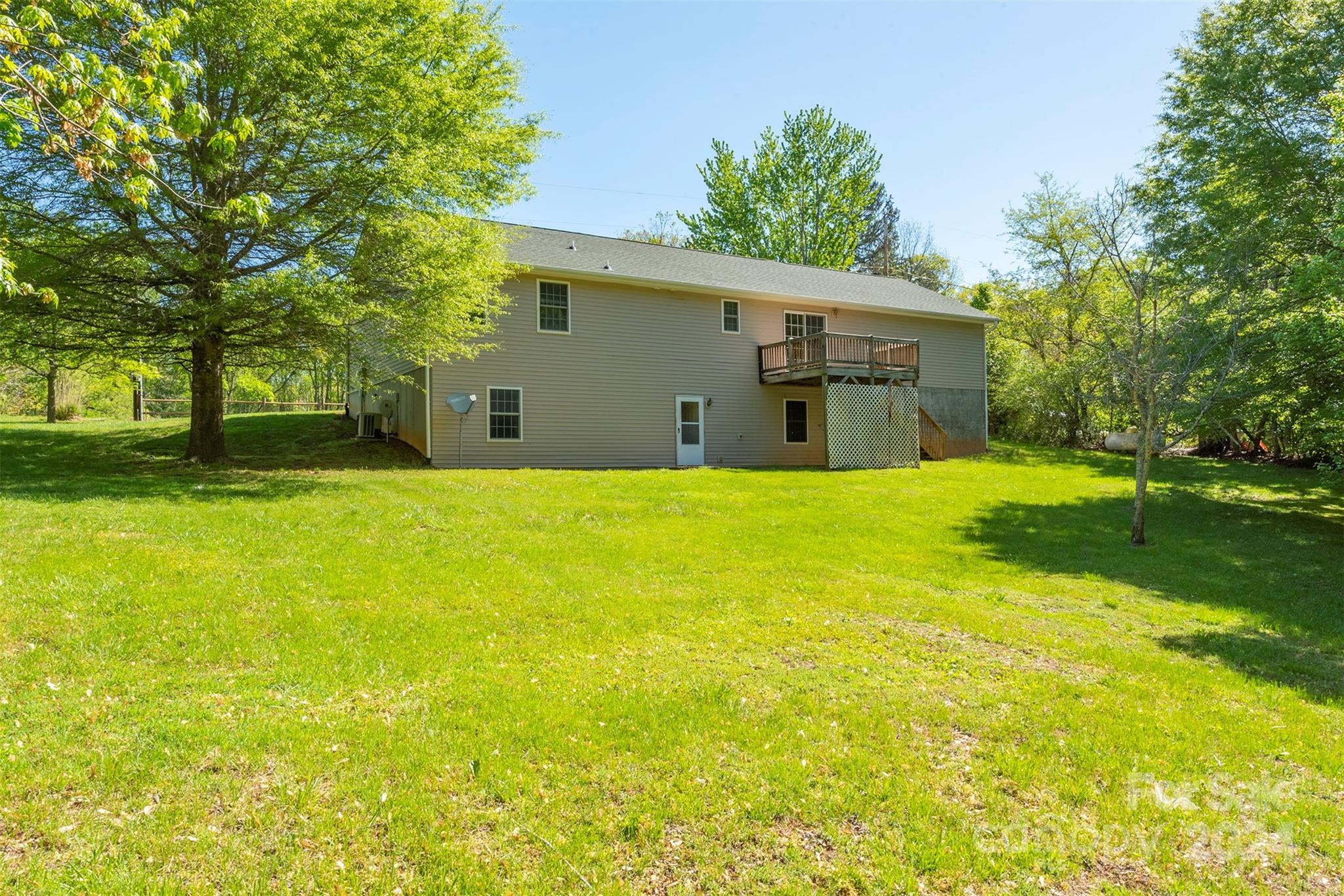 379 Buckeye Cove Road Swannanoa, NC 28778 - Photo 25 of 31 a view of a yard with a house