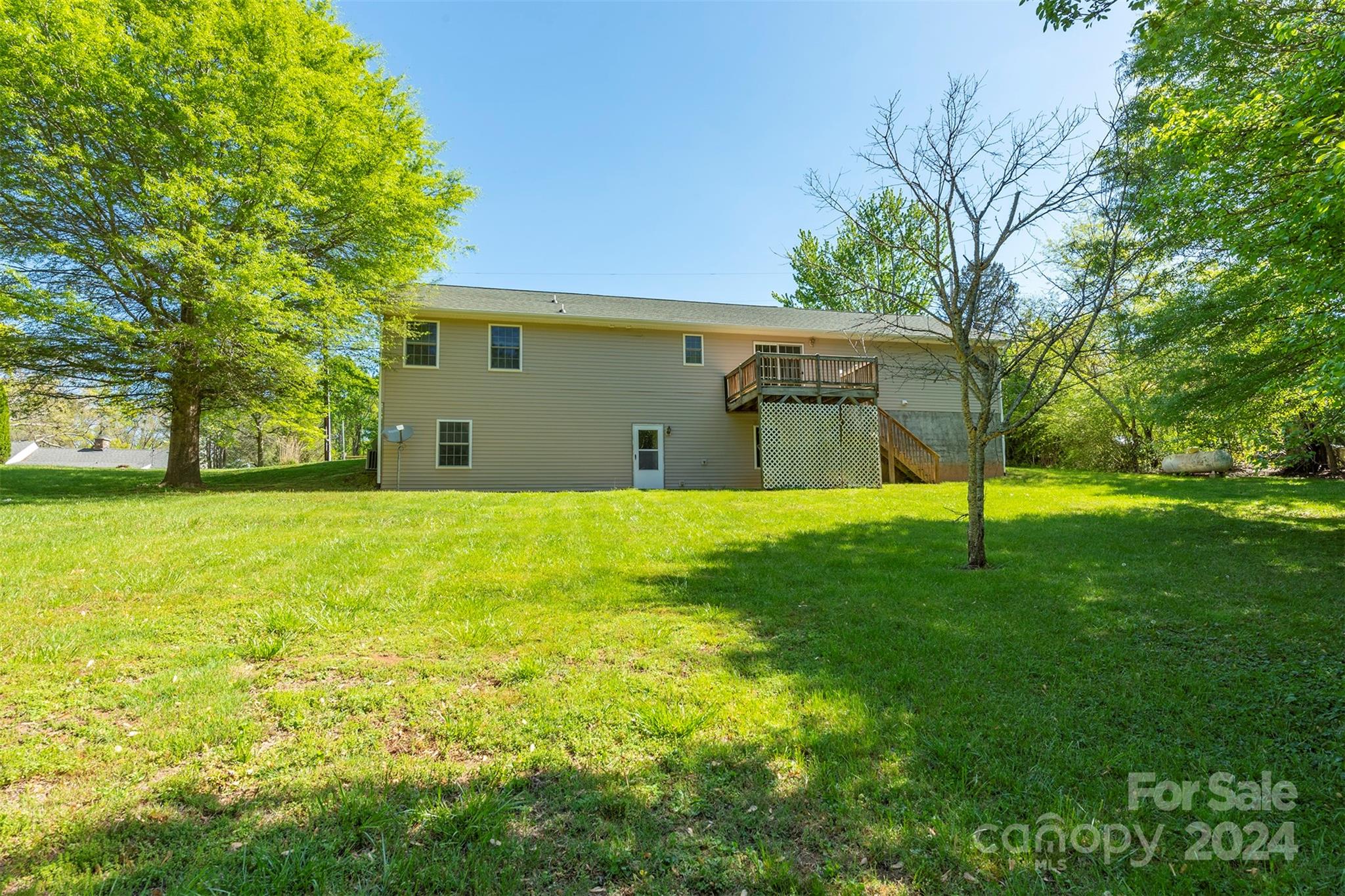379 Buckeye Cove Road Swannanoa, NC 28778 - Photo 26 of 31 a view of a house with a yard