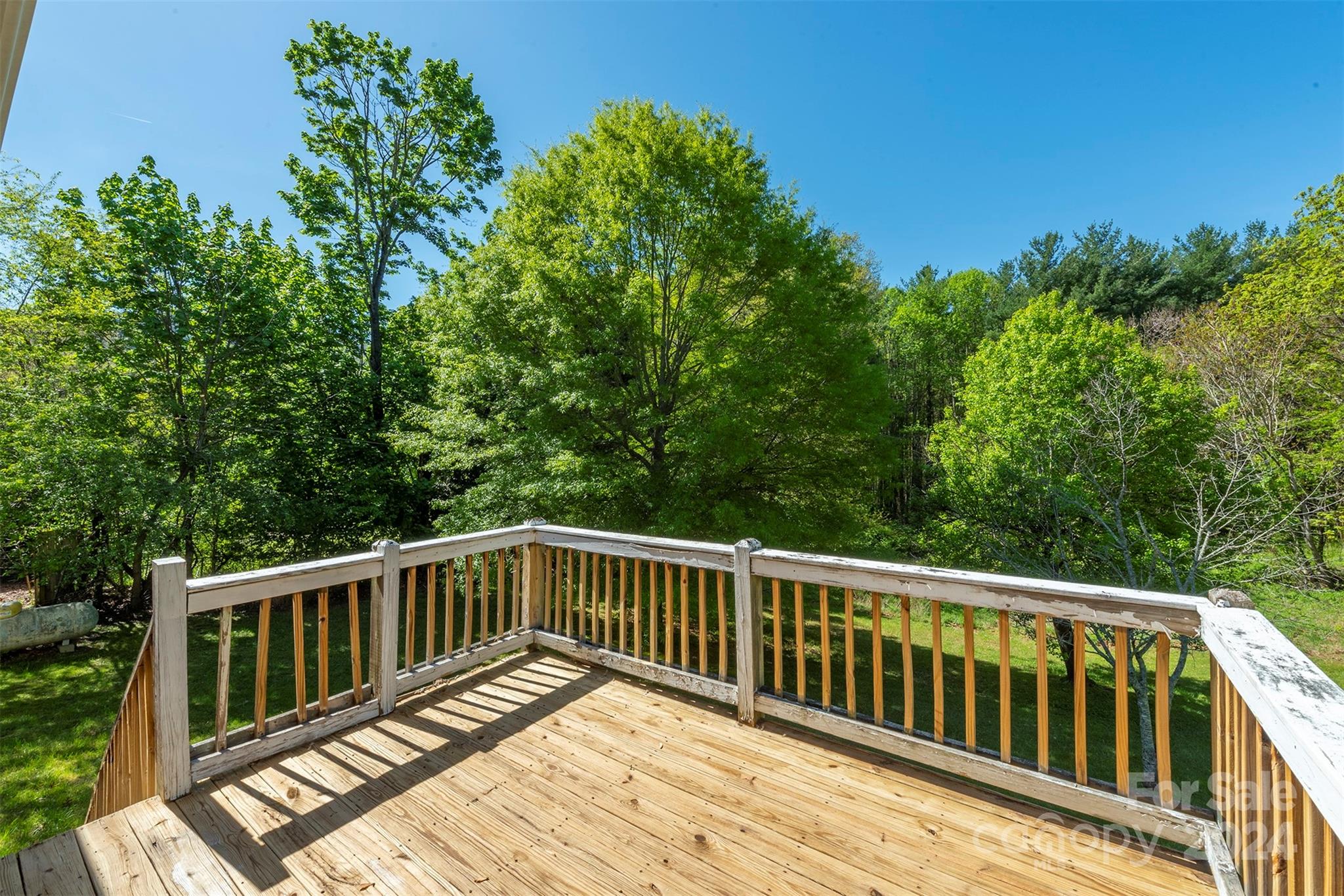 379 Buckeye Cove Road Swannanoa, NC 28778 - Photo 30 of 31 a view of balcony with wooden floor and fence