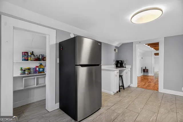 a view of a kitchen with washer and dryer