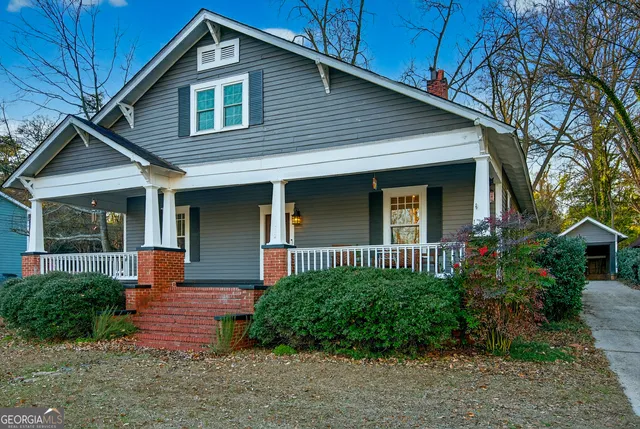 a front view of a house with balcony