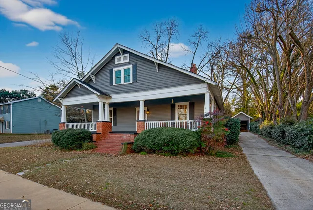 a view of porch with wooden floor