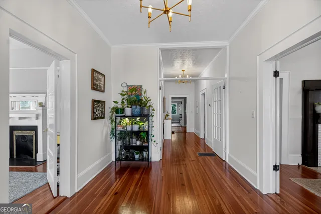 a bedroom with furniture and a fireplace