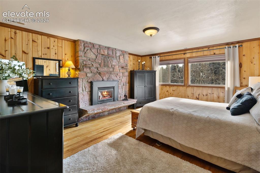 2809 Edlowe Road Woodland Park, CO 80863 - Photo 15 of 42 Primary suite with gas fireplace!