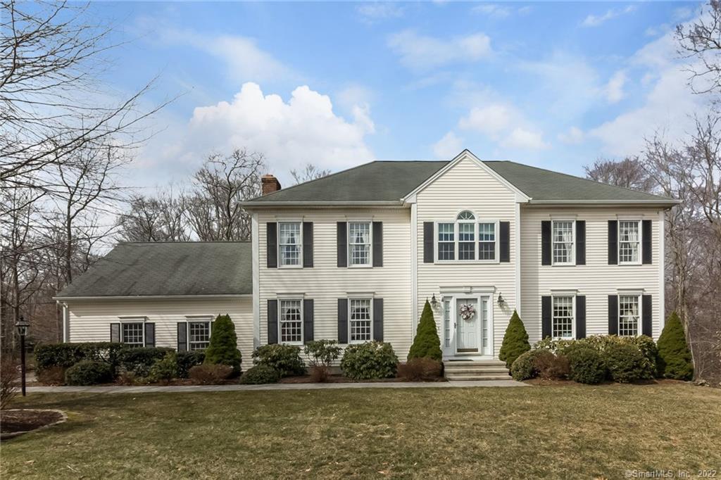 414 Willow Road Guilford, CT 06437 - Photo 1 of 1 a front view of a house with garden