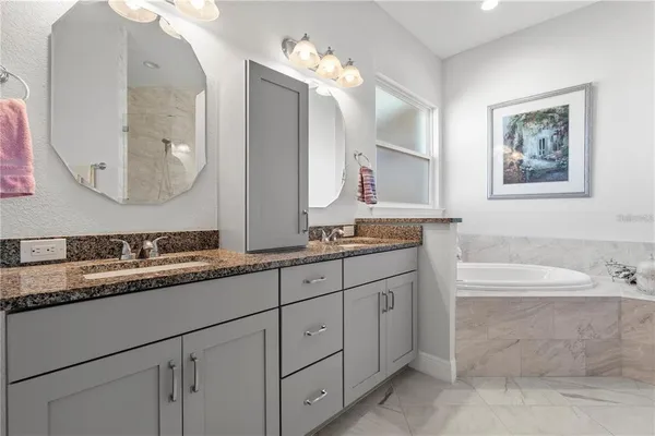 a bath tub sitting next to a bathroom
