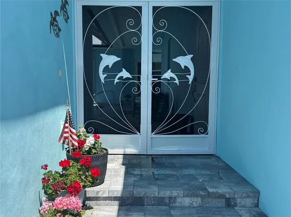 a room with a couch and a rug