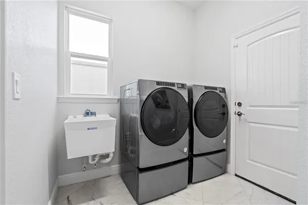 a view of outdoor dining space with furniture and wooden floor