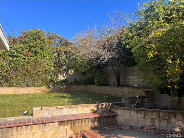 a view of a lake with a yard