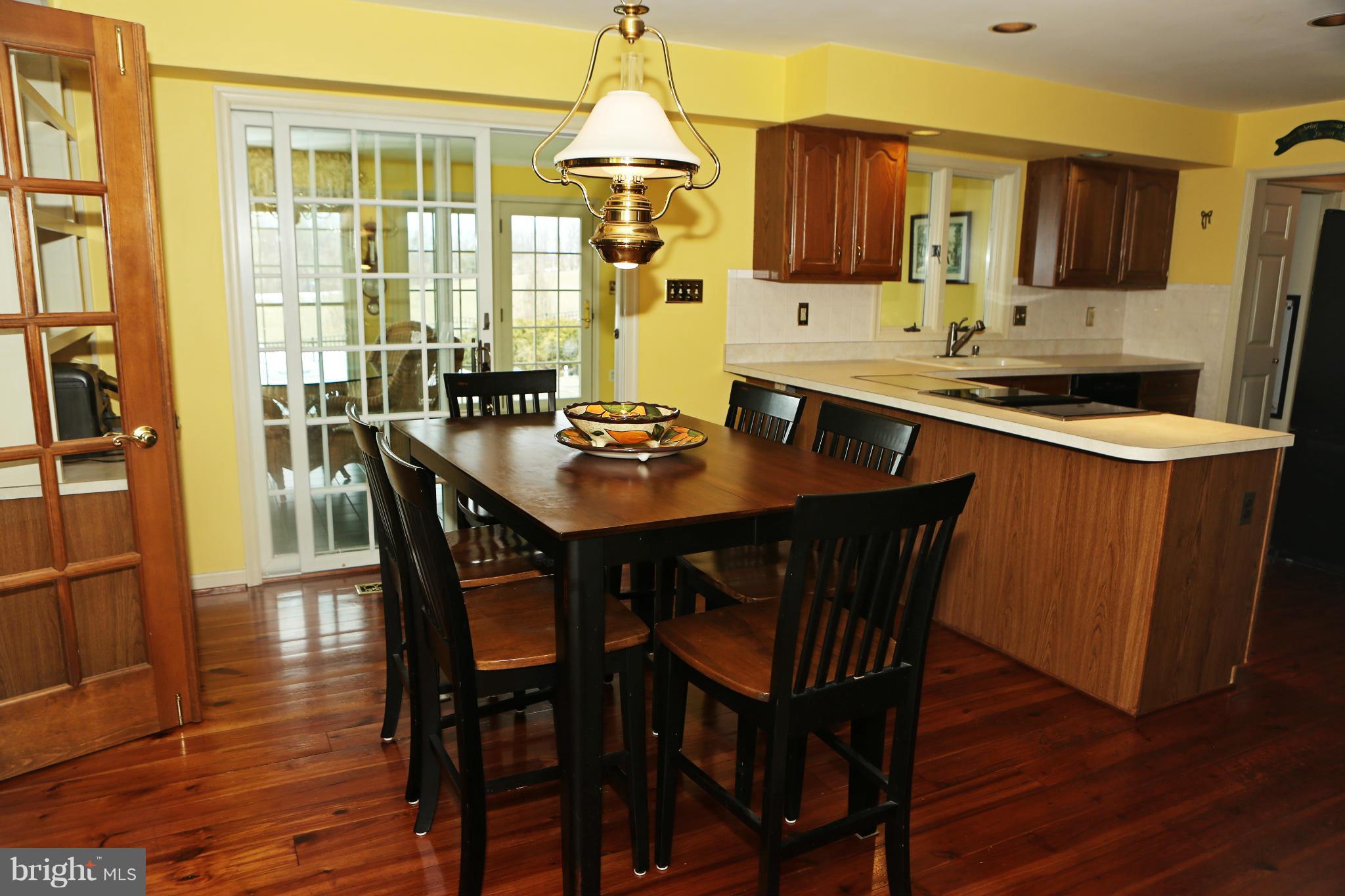 512 Rockspring Church Road Forest Hill, MD 21050 - Photo 10 of 30 Kitchen w/sliders to sunroom