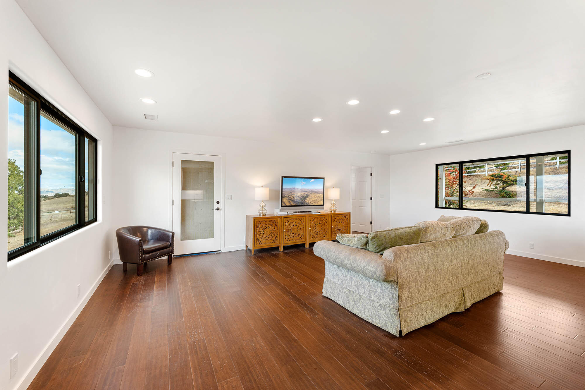 2170 Aliso Park Road New Cuyama, CA 93254 - Photo 25 of 71 a living room with furniture and wooden floor