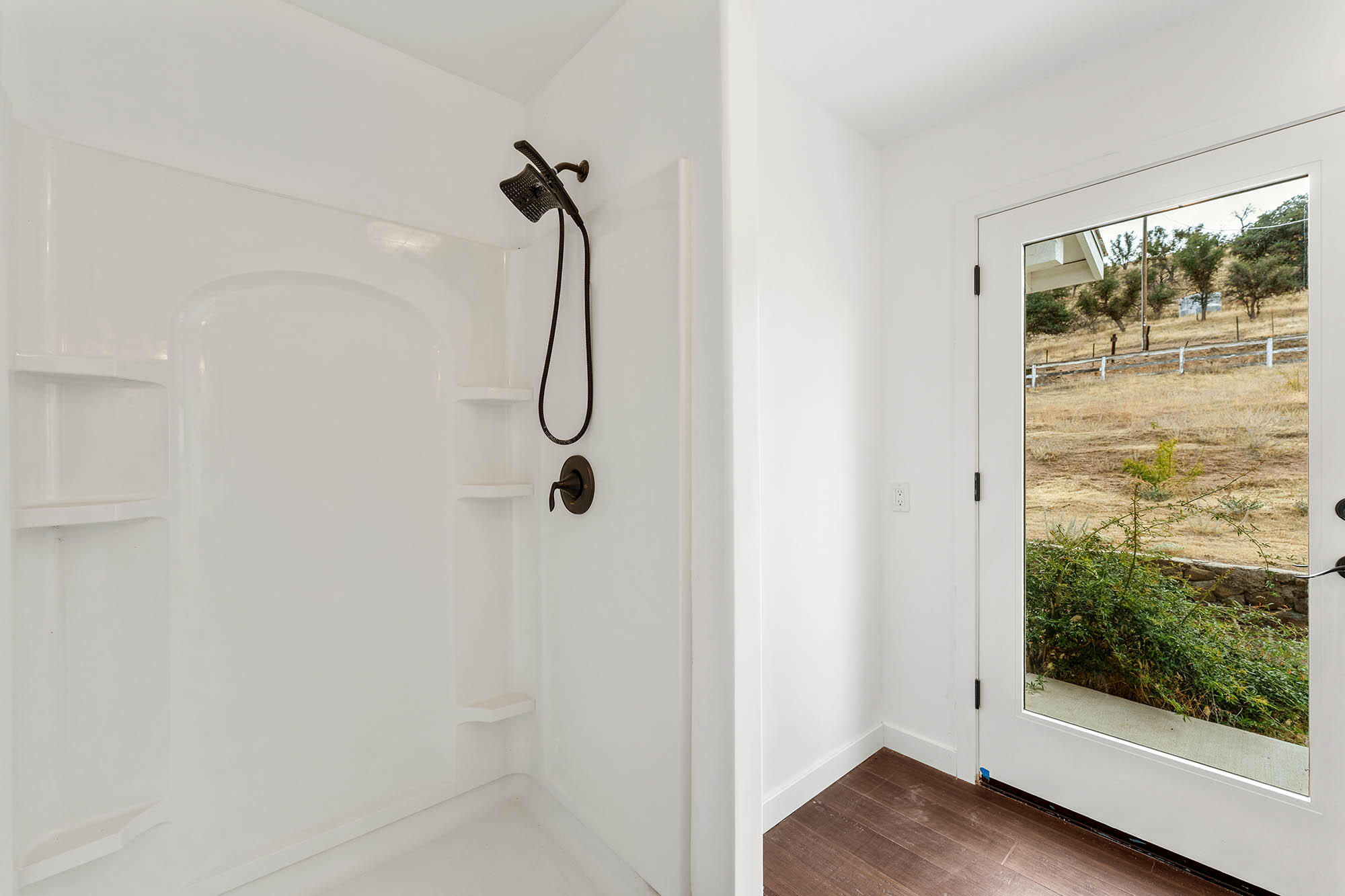 2170 Aliso Park Road New Cuyama, CA 93254 - Photo 33 of 71 a bathroom with a glass shower door