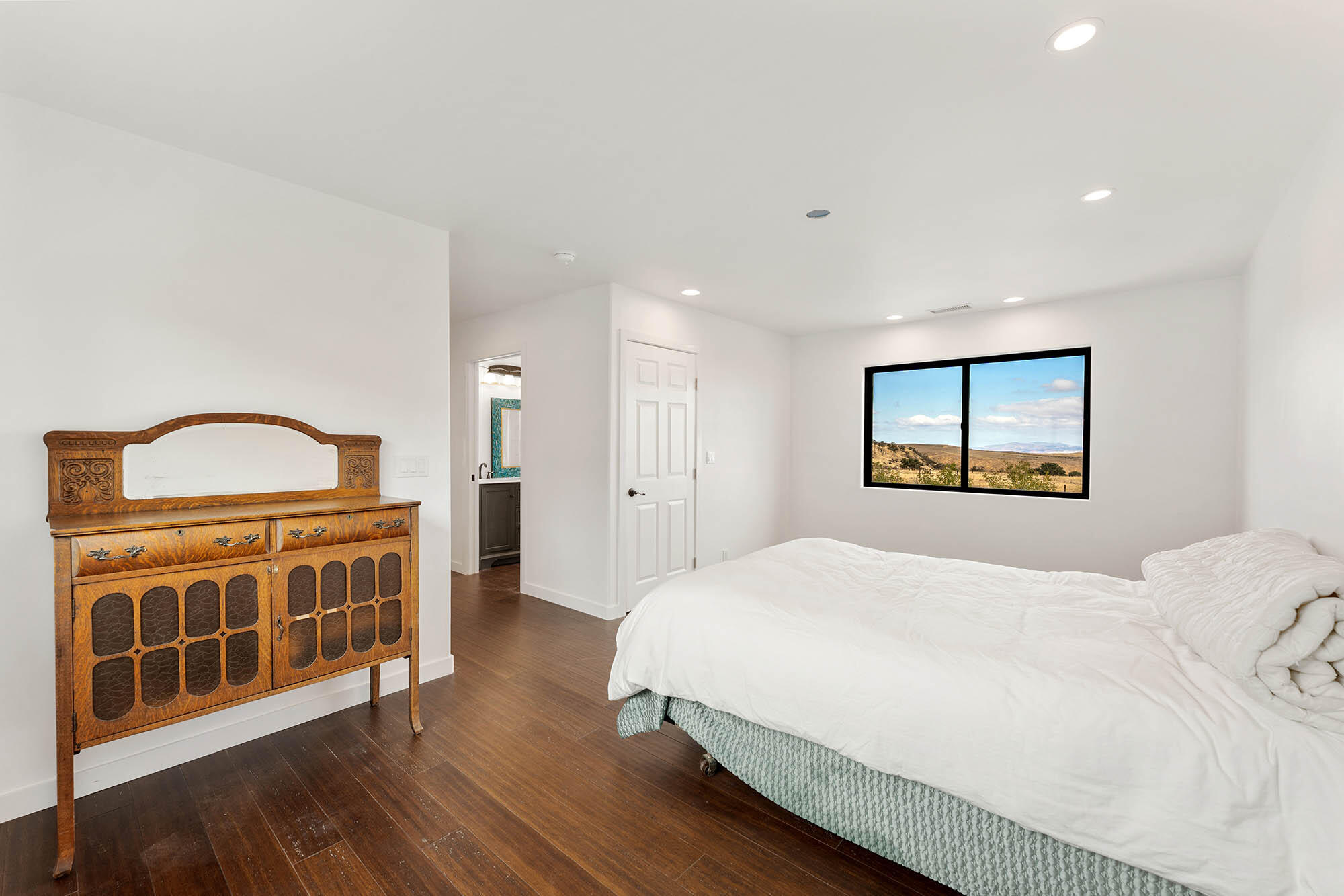 2170 Aliso Park Road New Cuyama, CA 93254 - Photo 9 of 71 a bedroom with a bed and a dresser