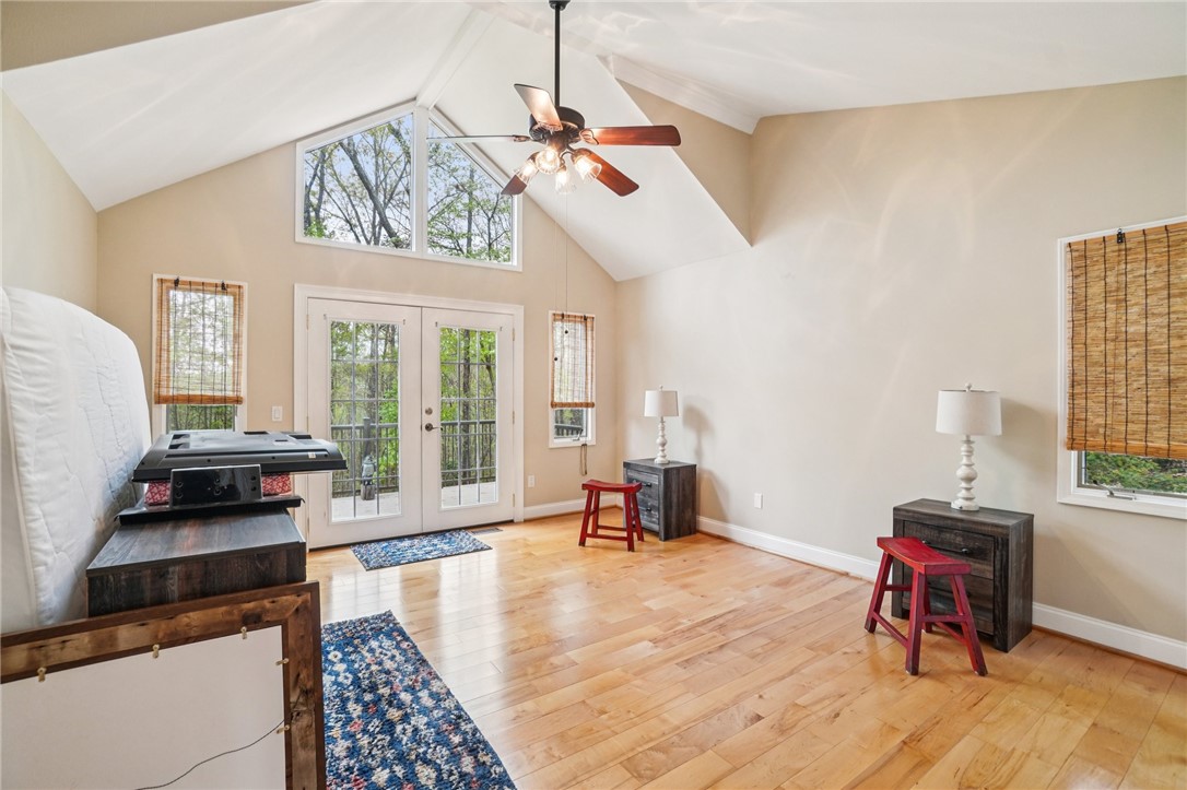 120 Beacon Ridge Circle Salem, SC 29676 - Photo 20 of 48 This airy room features vaulted ceilings, French doors, and hardwood floors.