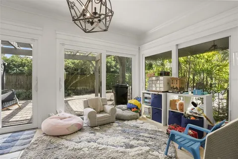 a room with furniture and a large window