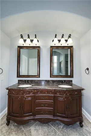 a white bath tub sitting next to a window