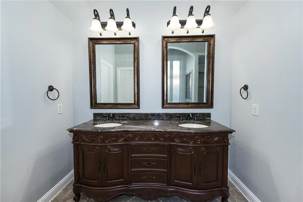 a view of room with window and ceiling fan