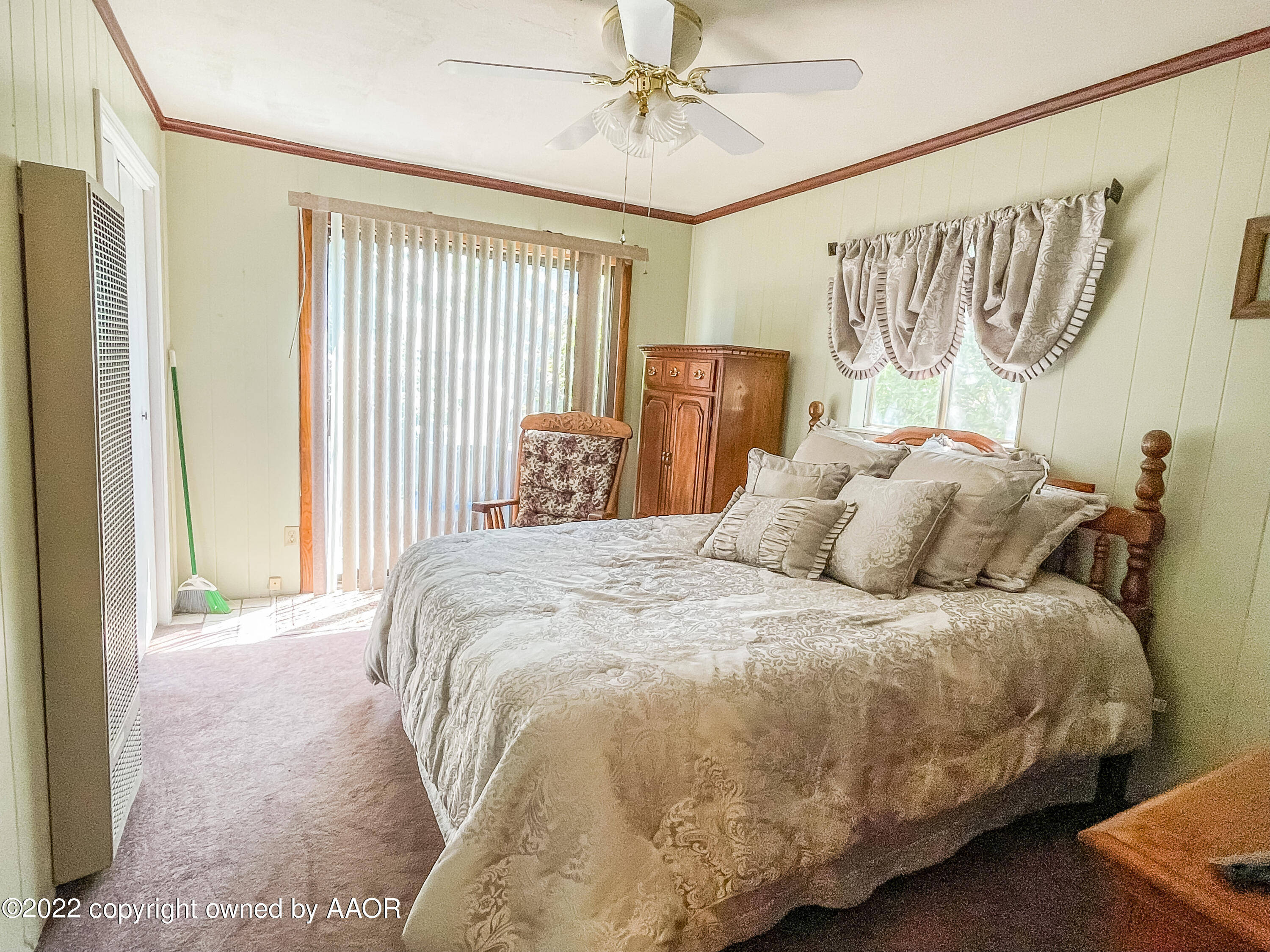 1314 Coble Drive Borger, TX 79007 - Photo 12 of 16 a large bed sitting in a bedroom next to a window