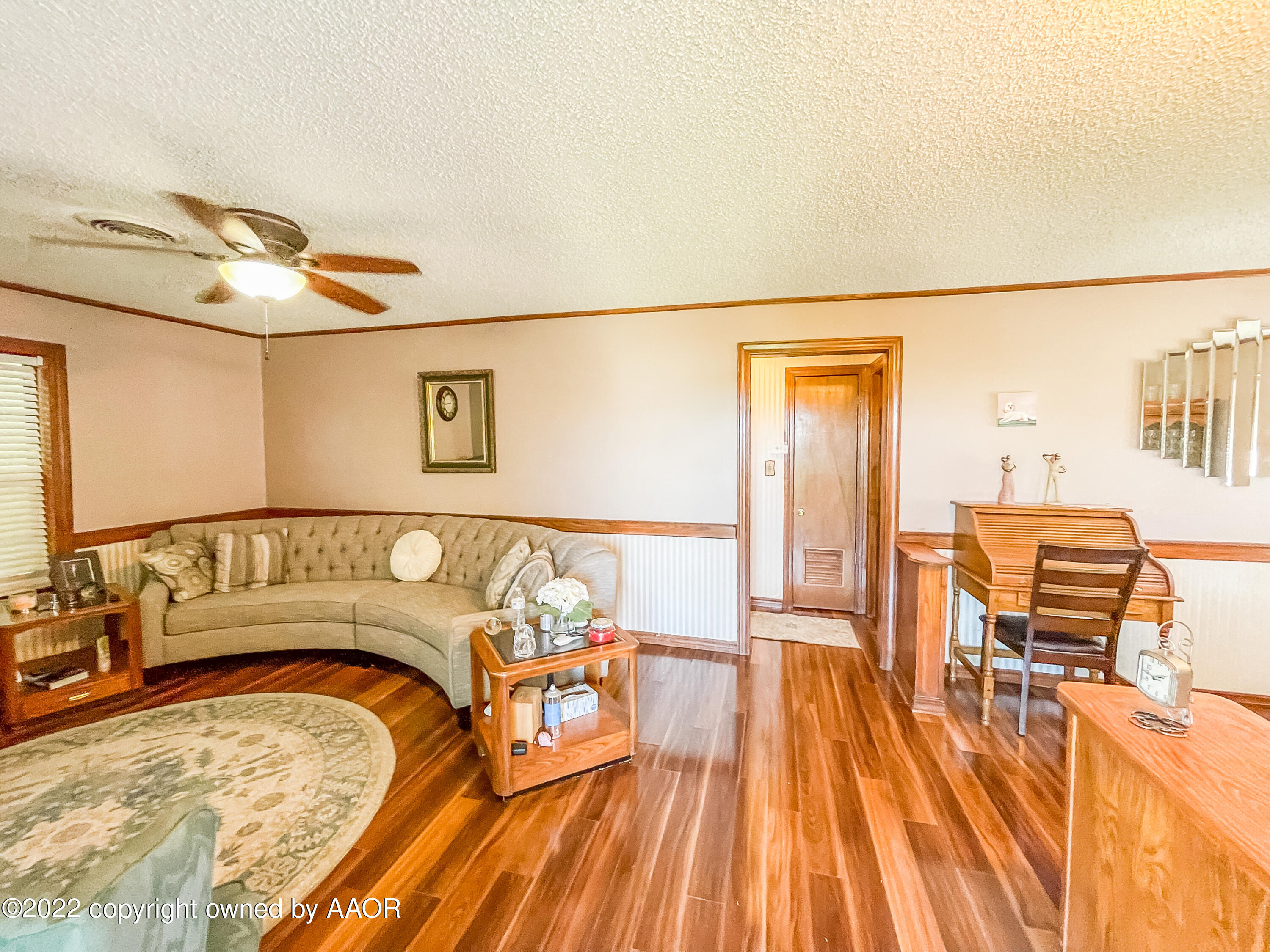 1314 Coble Drive Borger, TX 79007 - Photo 3 of 16 a bed room with a bed and a table