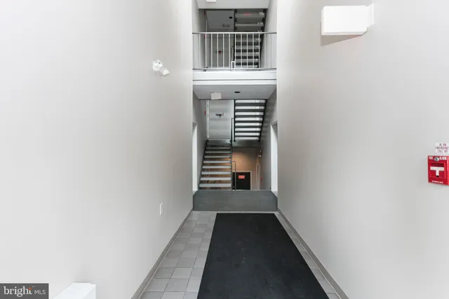 a view of a hallway with windows