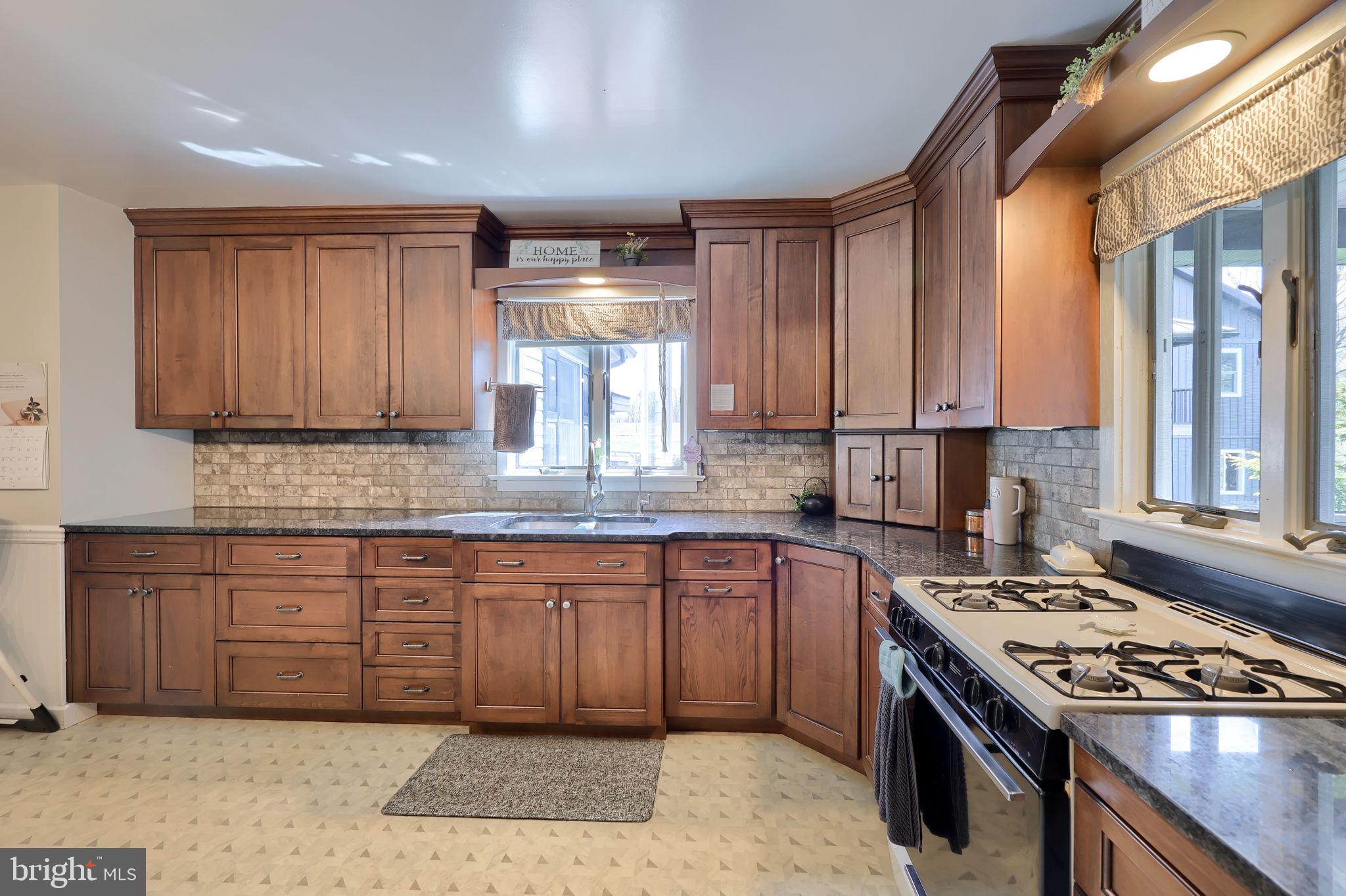 480 Jacobs Road Narvon, PA 17555 - Photo 21 of 90 a kitchen with a sink stove and cabinets