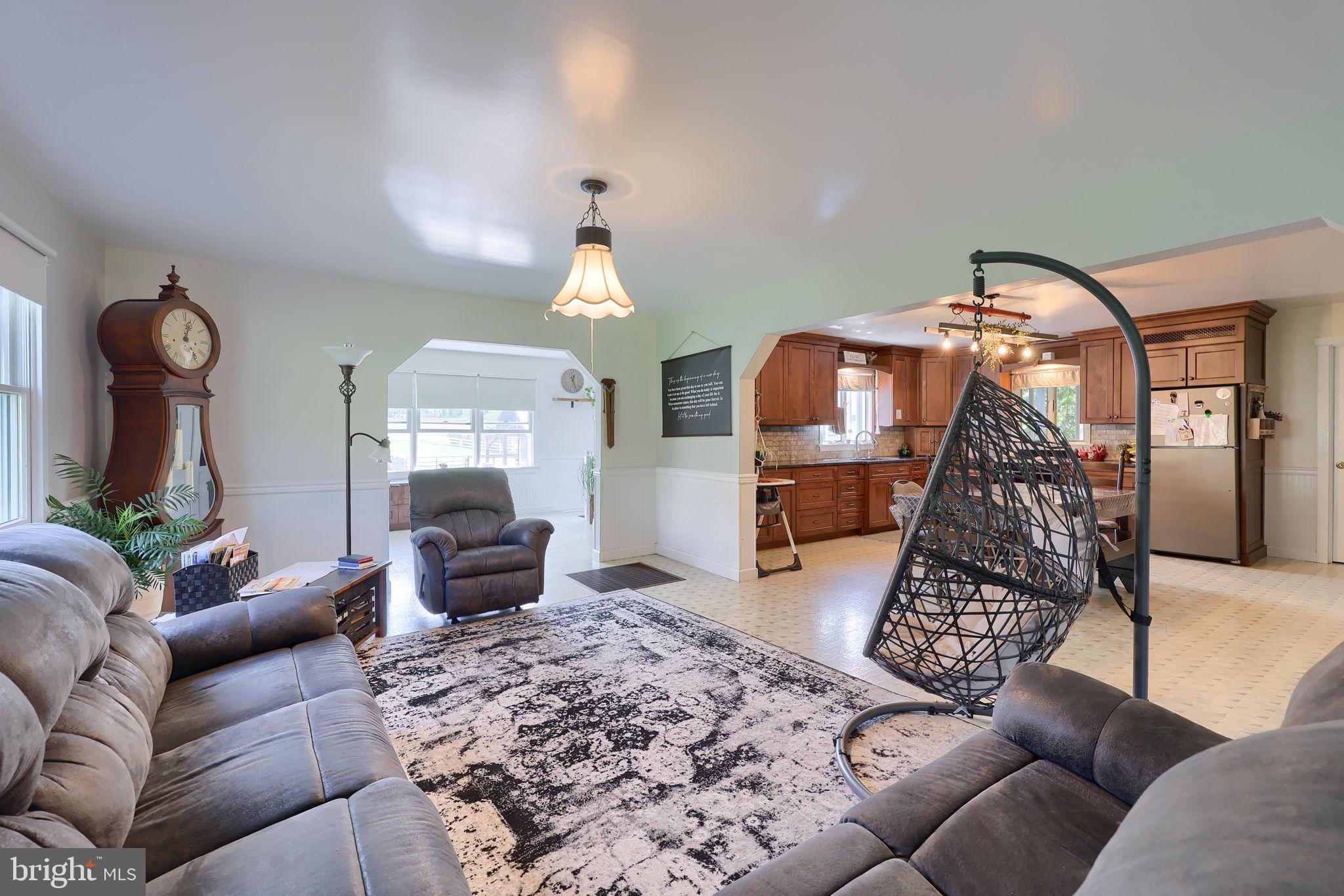 480 Jacobs Road Narvon, PA 17555 - Photo 27 of 90 a living room with furniture and a chandelier