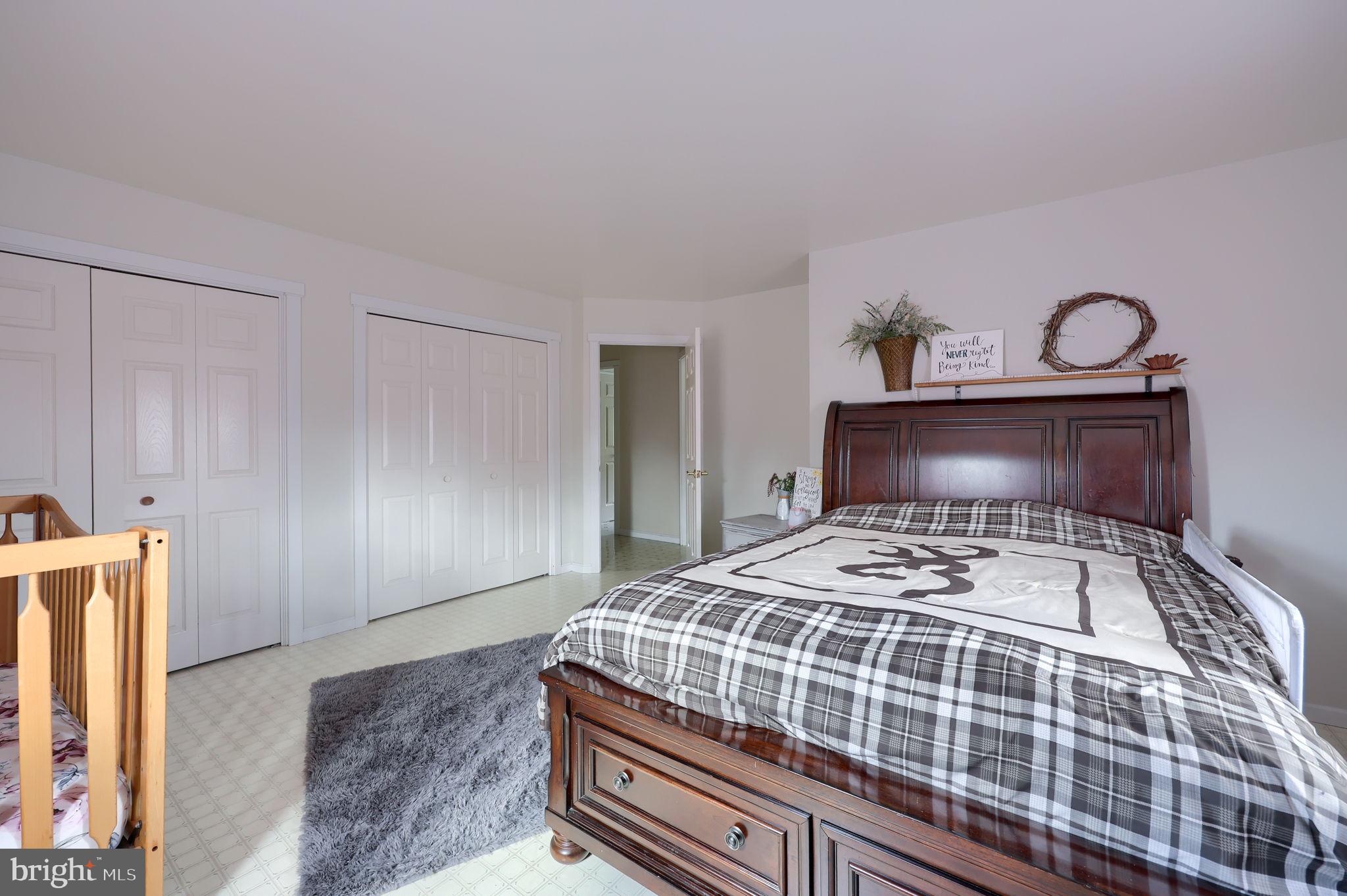 480 Jacobs Road Narvon, PA 17555 - Photo 38 of 90 a bedroom with a bed and wooden floor