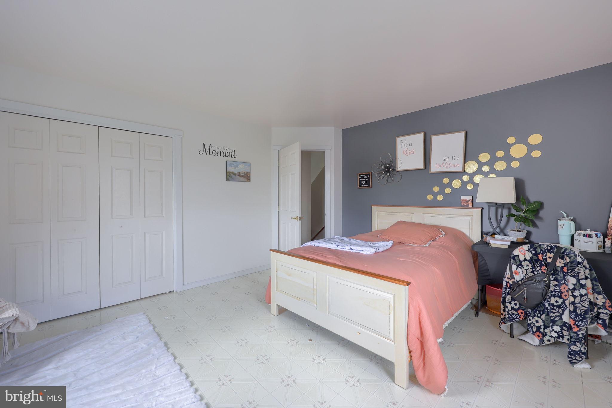 480 Jacobs Road Narvon, PA 17555 - Photo 40 of 90 a bedroom with a bed and a chandelier