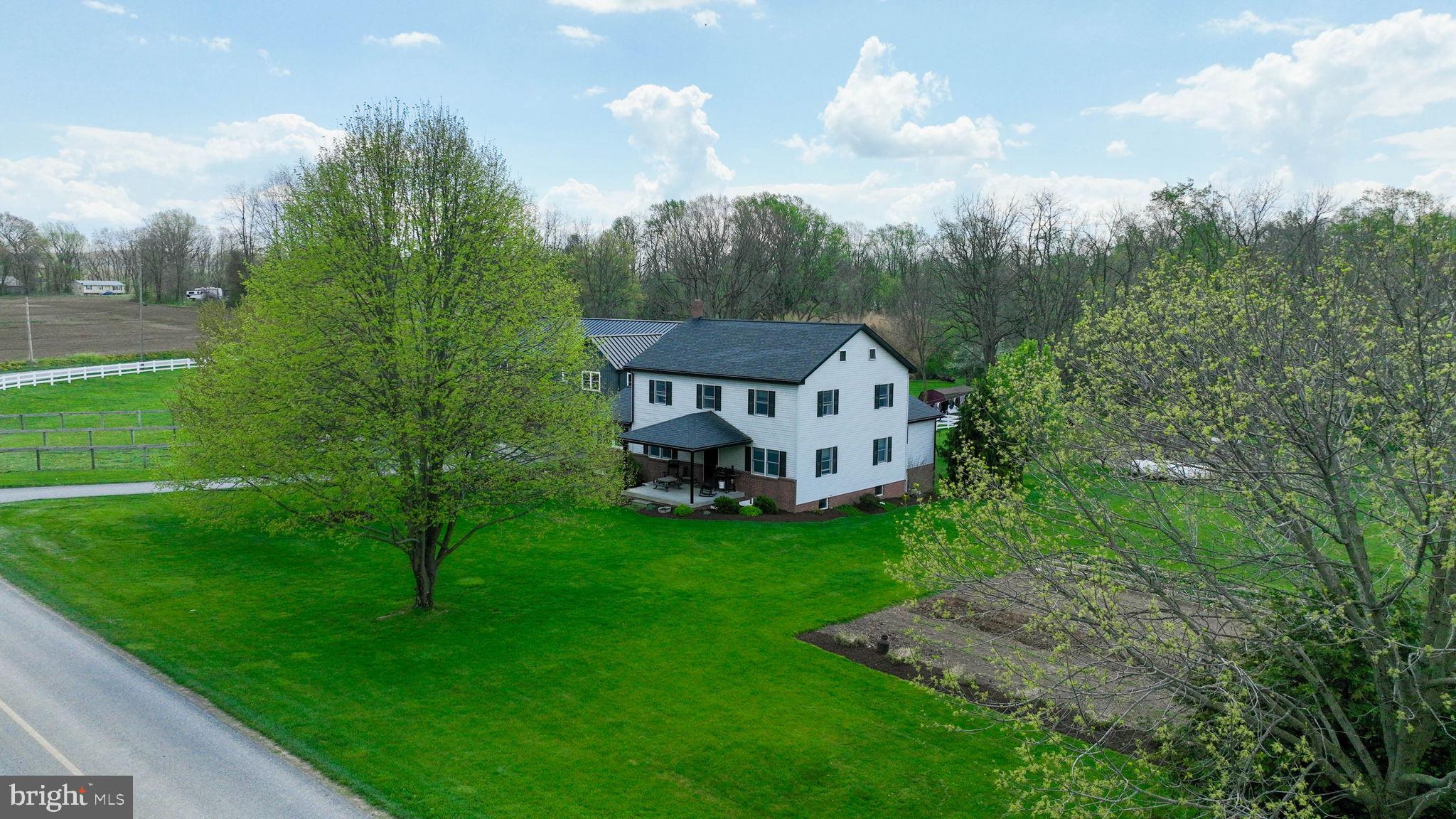 480 Jacobs Road Narvon, PA 17555 - Photo 4 of 90 a view of a house with backyard and garden