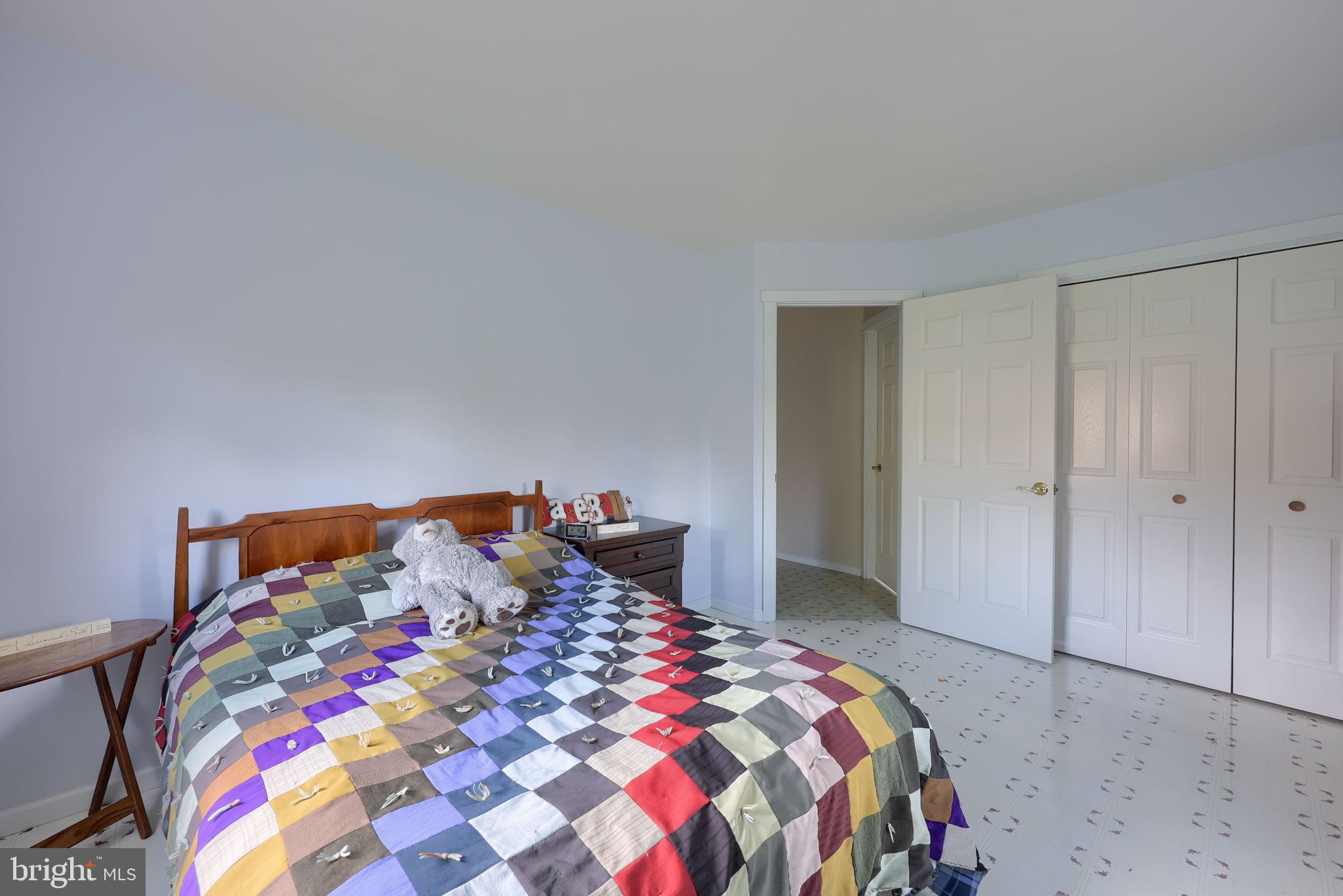 480 Jacobs Road Narvon, PA 17555 - Photo 44 of 90 Cozy bedroom with vibrant quilt charm.