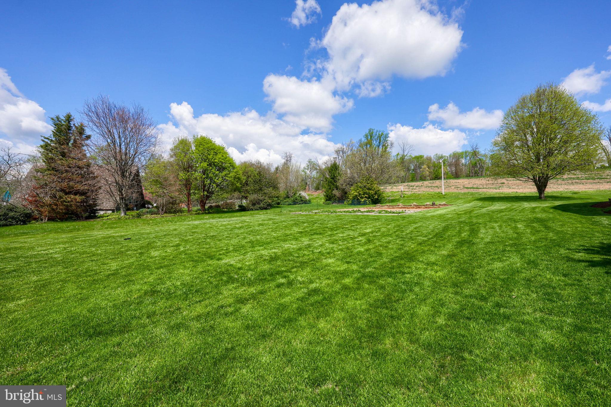 480 Jacobs Road Narvon, PA 17555 - Photo 54 of 90 a view of a golf course with a lake