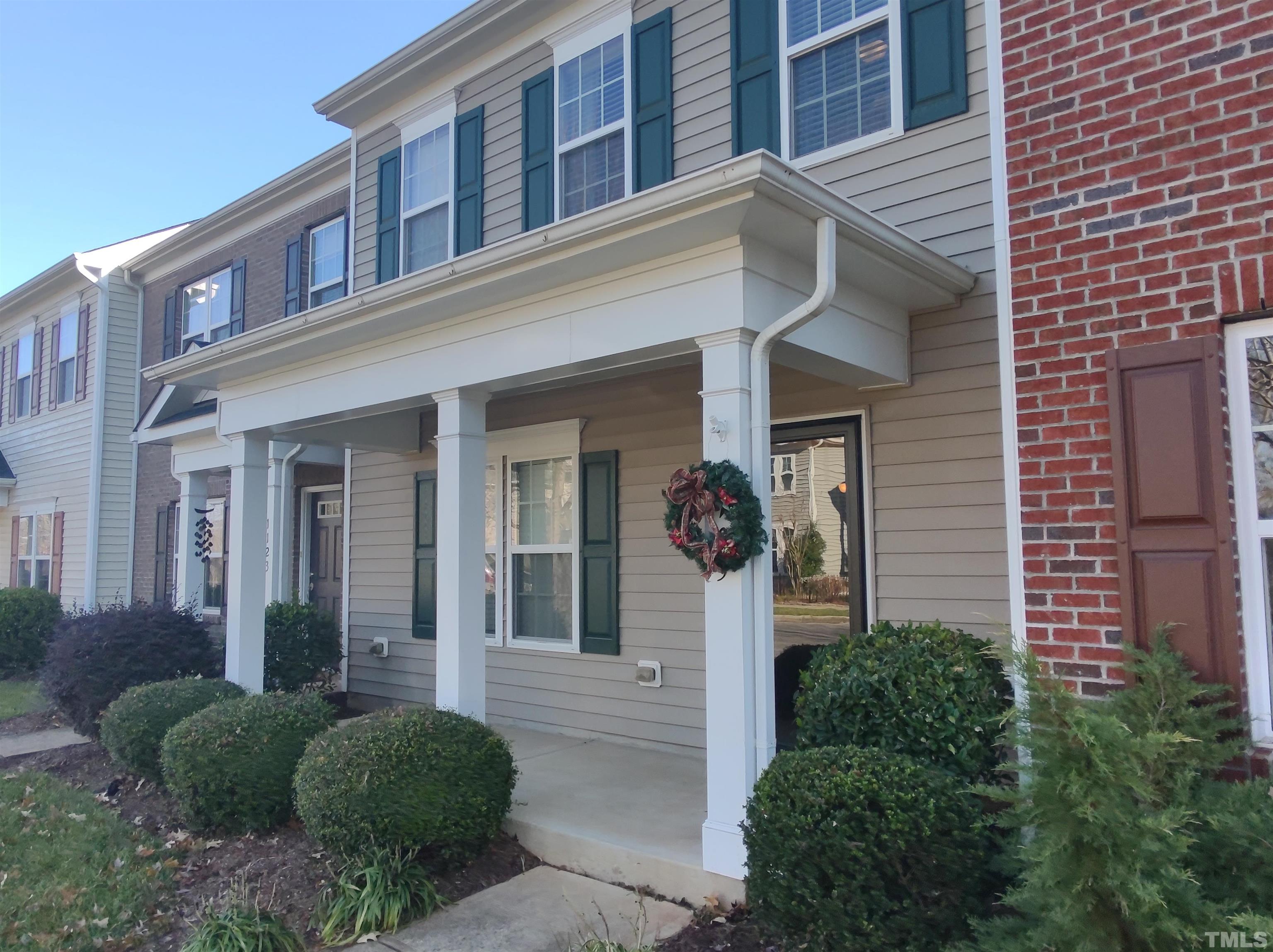 1125 Ileagnes Road Raleigh, NC 27603 - Photo 2 of 27 front view of a house with a small yard