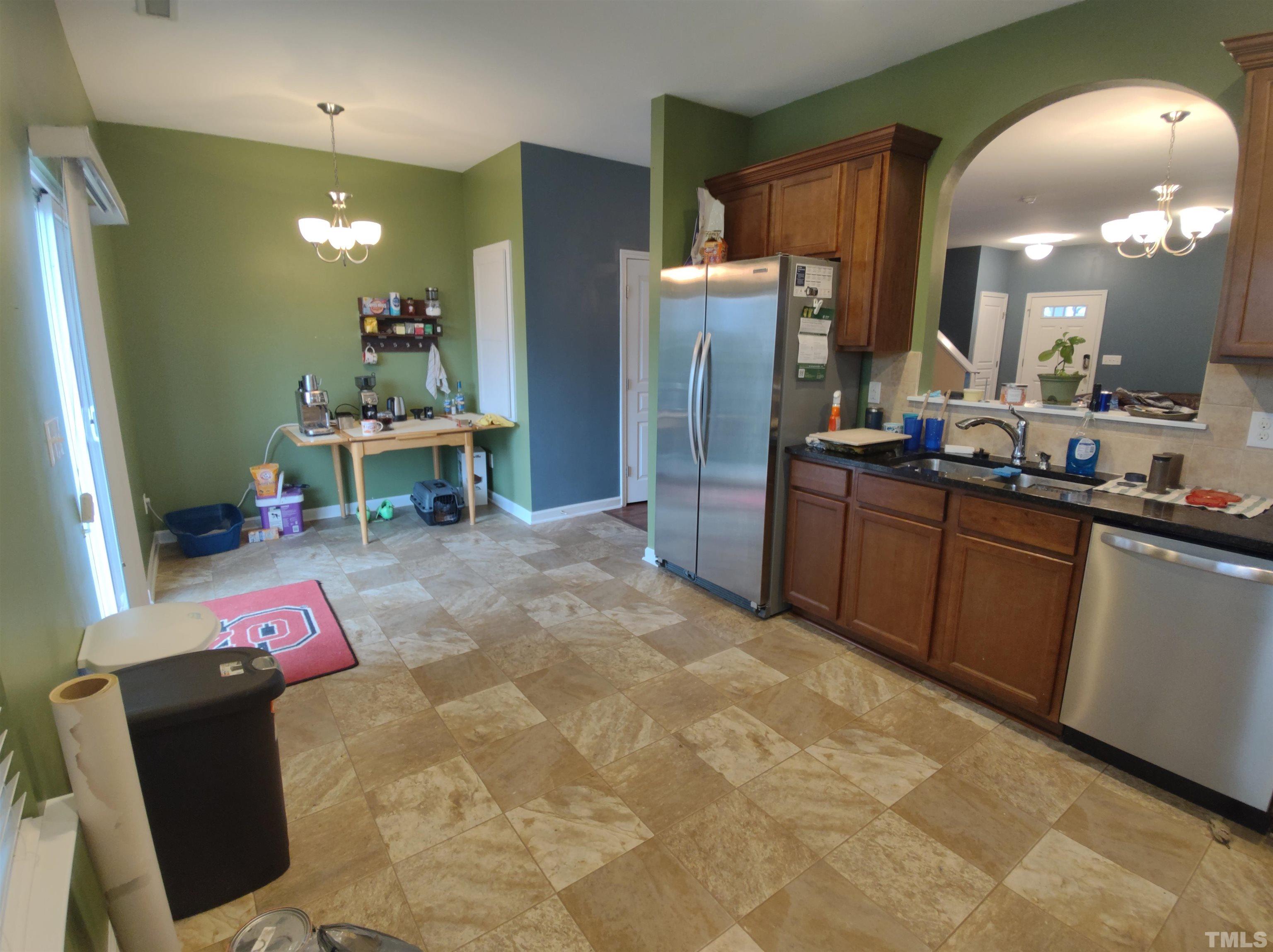 1125 Ileagnes Road Raleigh, NC 27603 - Photo 15 of 27 a kitchen with sink and refrigerator