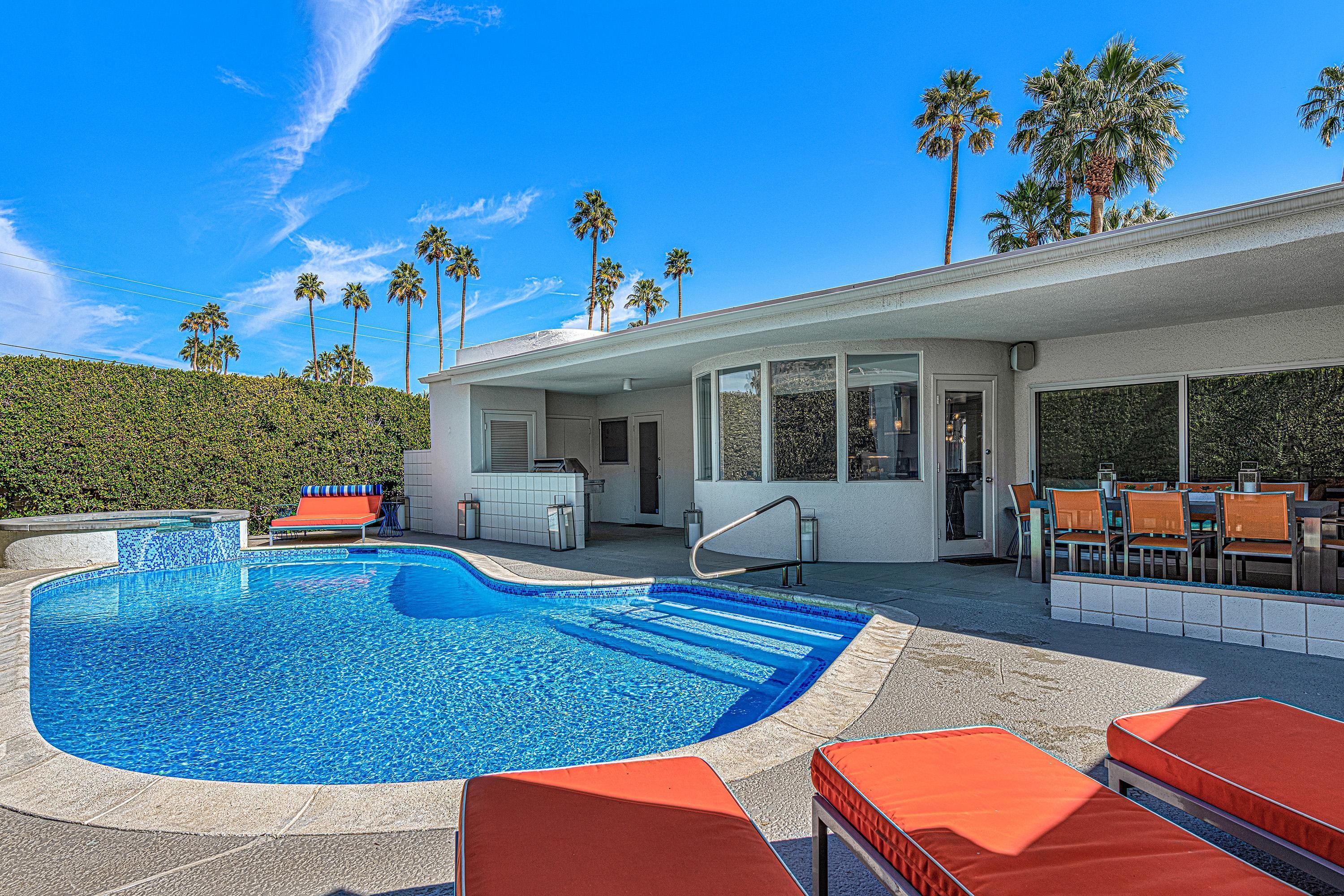 1130 East Deepwell Road Palm Springs, CA 92264 - Photo 15 of 55 swimming pool view with seating space