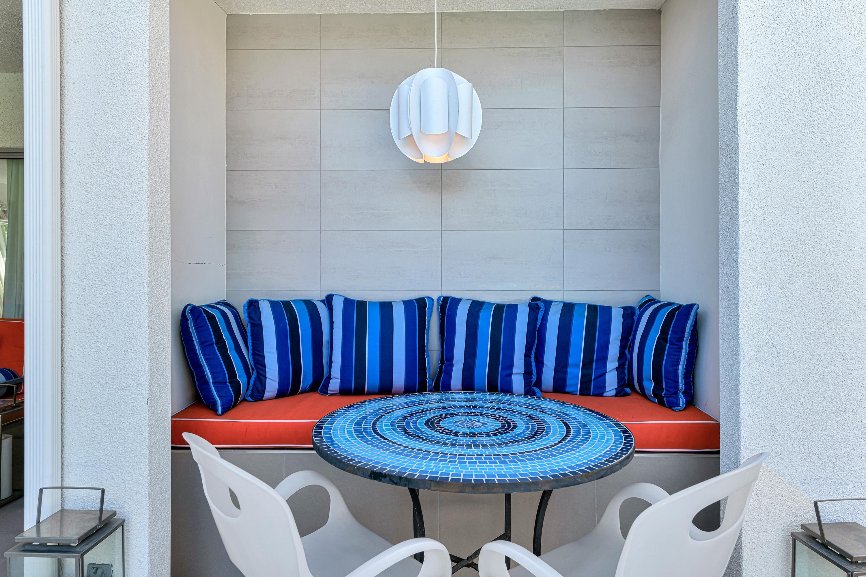 1130 East Deepwell Road Palm Springs, CA 92264 - Photo 16 of 55 a view of a dining room with furniture