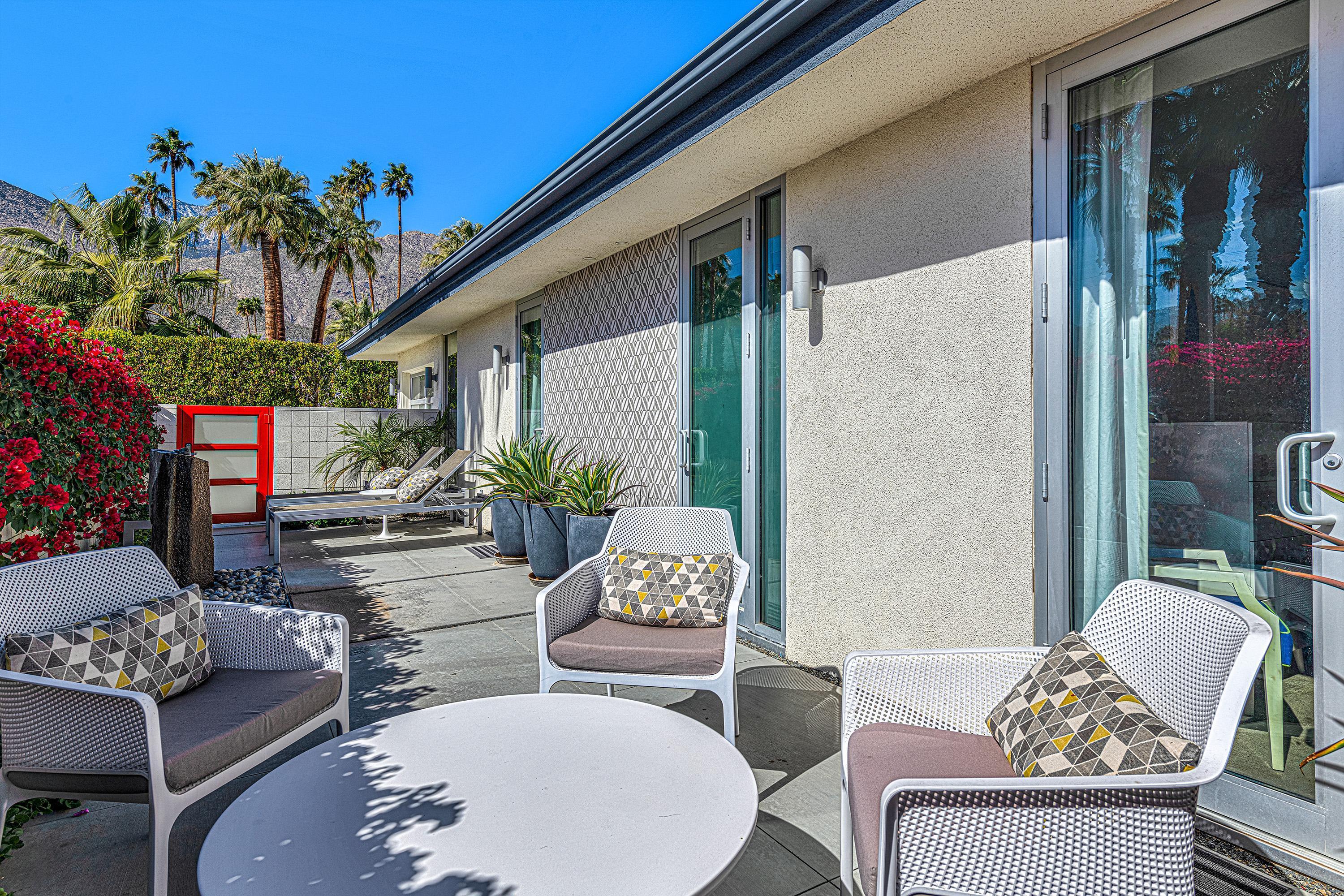 1130 East Deepwell Road Palm Springs, CA 92264 - Photo 27 of 55 a outdoor living room with furniture