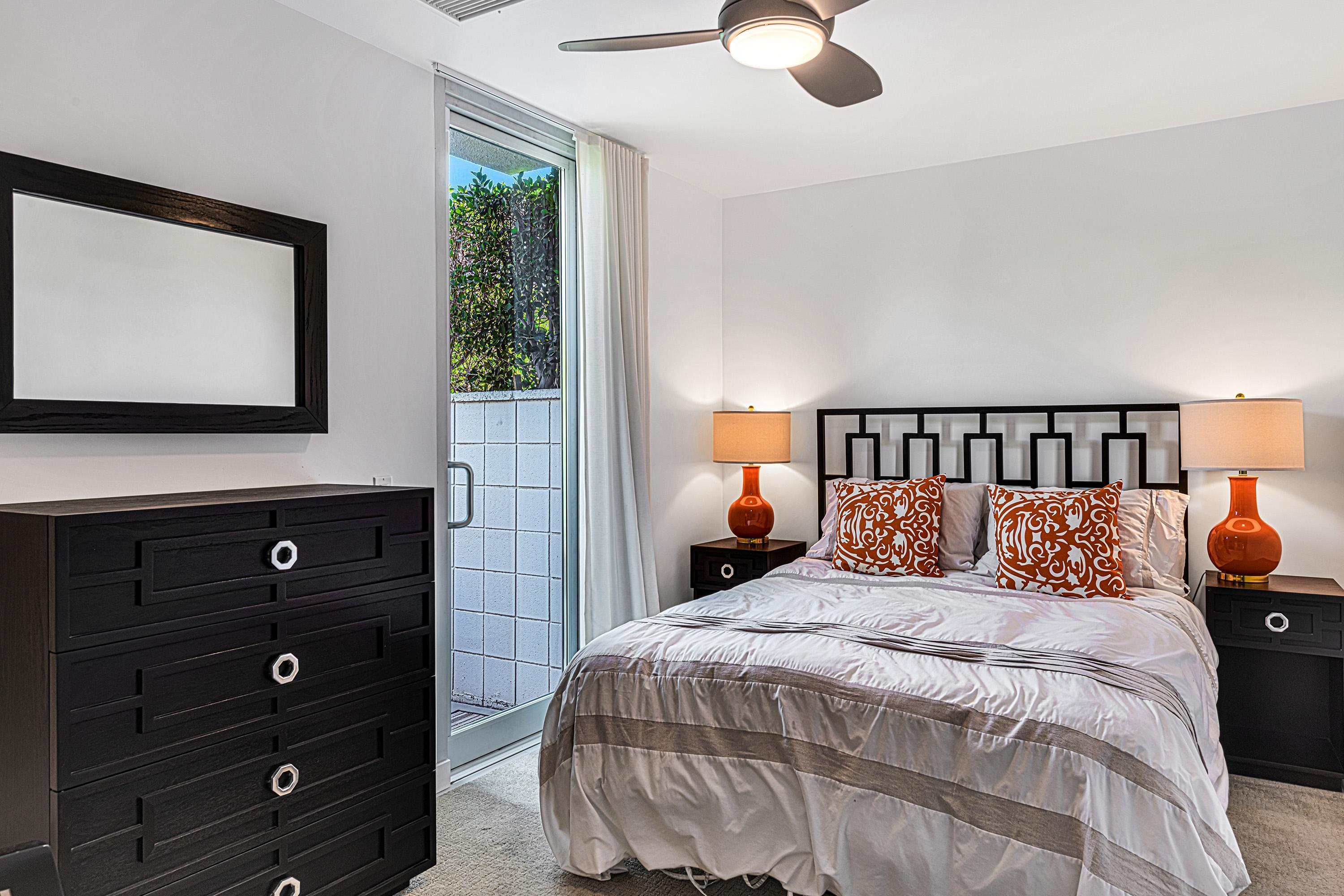 1130 East Deepwell Road Palm Springs, CA 92264 - Photo 32 of 55 a bedroom with a bed and window