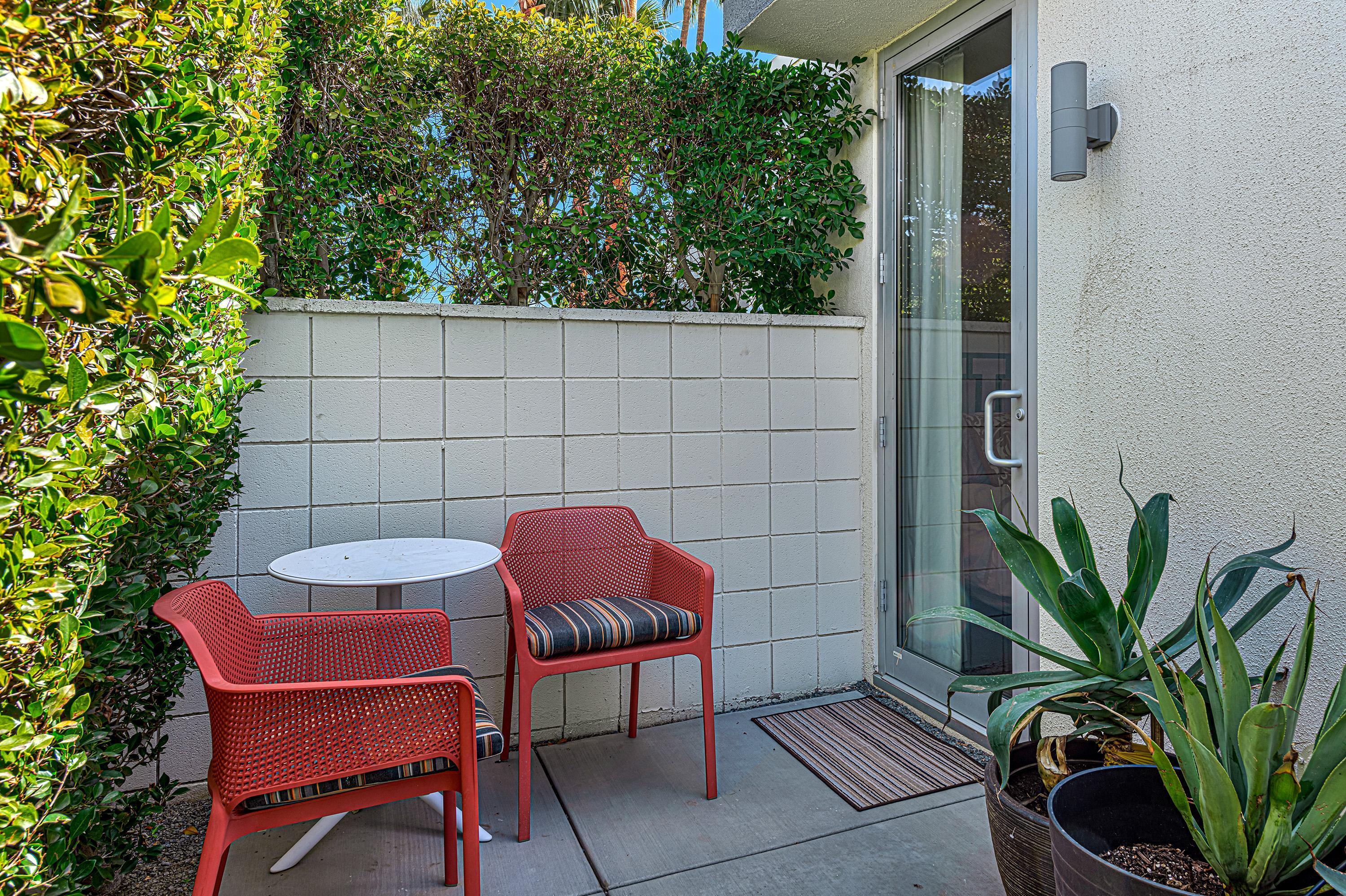 1130 East Deepwell Road Palm Springs, CA 92264 - Photo 33 of 55 a outdoor view with a seating space